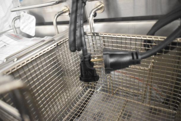 Brand new Globe PF32E stainless steel 2-bay electric fryer with metal baskets, 208/240V, 1 phase, countertop model.