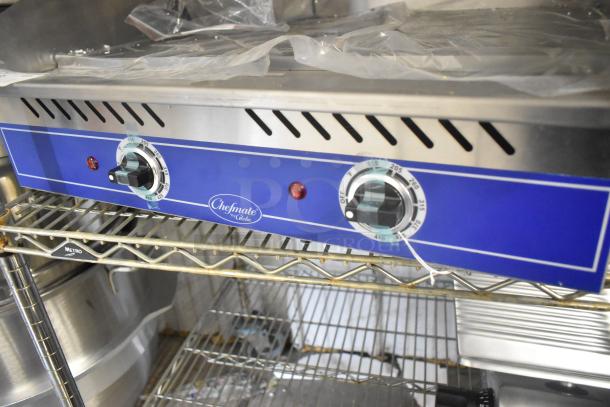 Brand new Globe GEG24 stainless steel 24" electric griddle with thermostatic controls, Chefmate label visible.