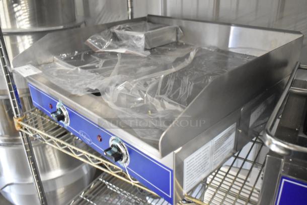 Brand new Globe GEG24 stainless steel 24" electric griddle with thermostatic controls, sealed packaging visible.