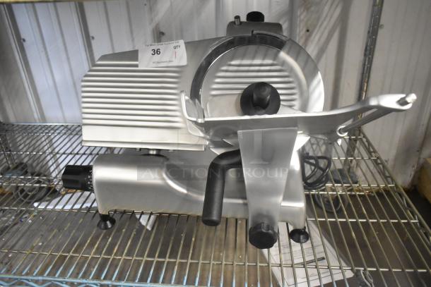 Brand new Globe G10 stainless steel commercial meat slicer with blade sharpener, 120 volts, 1 phase, in pristine condition.