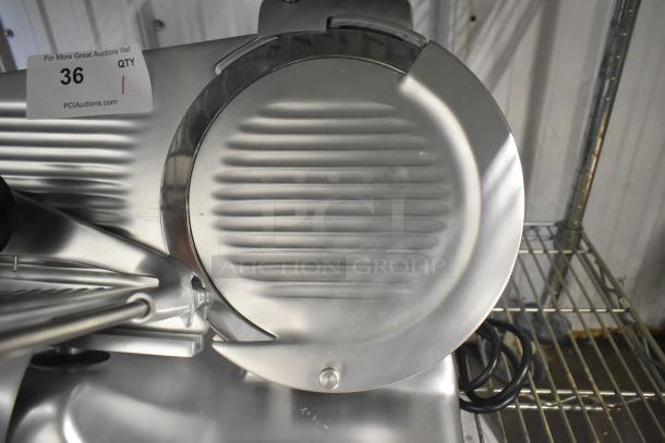 Brand new Globe G10 stainless steel commercial meat slicer, 120V, 1 phase, with blade sharpener, in excellent condition.