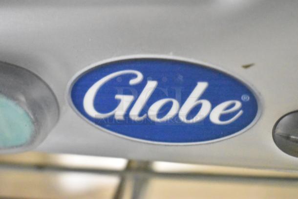 Brand new Globe G10 stainless steel commercial meat slicer, includes blade sharpener. Features 120 volts, 1 phase.