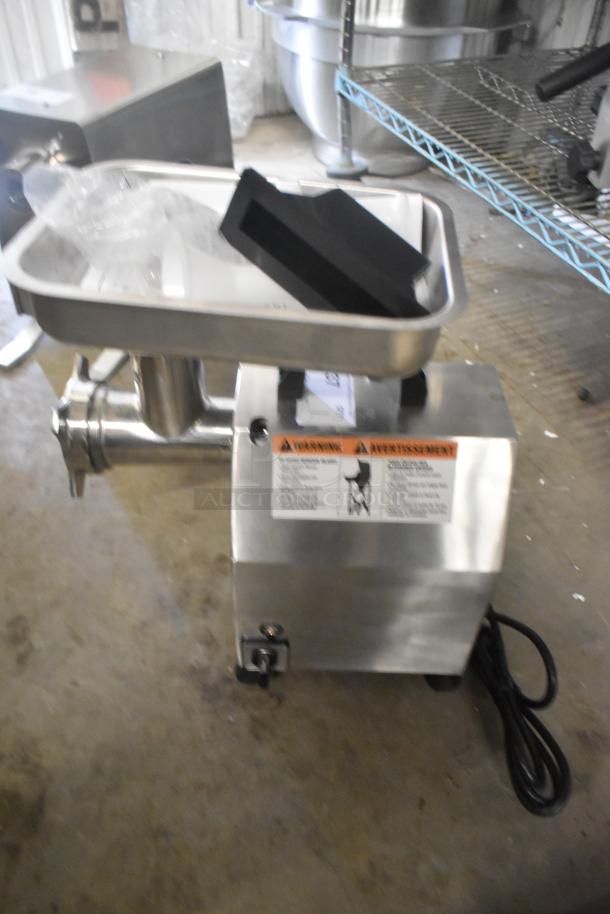 Brand new Globe CM12 stainless steel meat chopper, #12 head, 250 lbs/hr capacity, 120V, 1 phase, visible warning labels.