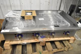 BRAND NEW 2024 Globe GG48TG 48" Stainless Steel Gas Griddle, thermostatic controls, 120,000 BTU, on palette.
