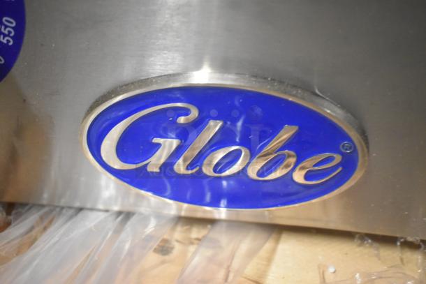 Brand new Globe GG48TG stainless steel commercial griddle, 48", thermostatic controls, 120,000 BTU, logo visible.