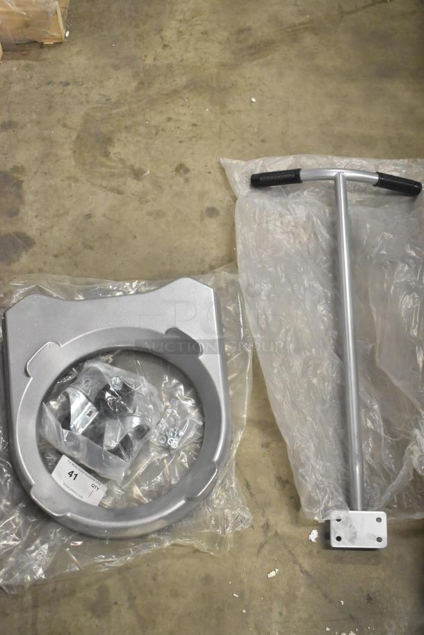 Brand new metal commercial mixing bowl dolly with T-handle, assembly parts, and plastic-wrapped base, ready for use.