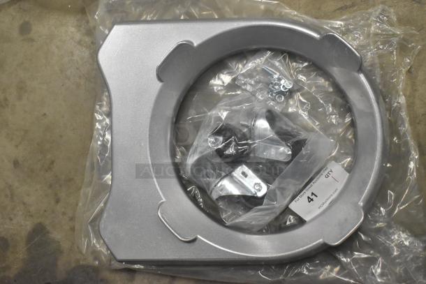 Brand new metal commercial mixing bowl dolly in original packaging. Includes wheels and hardware. Auction item 41 tag visible.