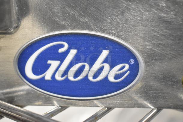 Brand new Globe metal commercial pelican head with slicing blade, features durable construction and sharp cutting capability.