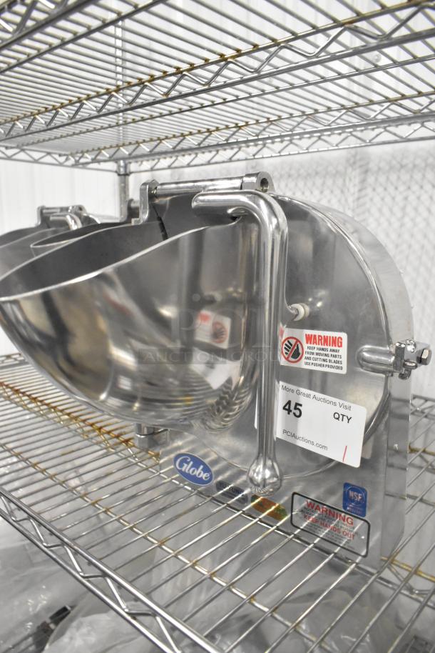 New Globe Metal Commercial Pelican Head, no blade. Stainless steel, warning labels visible, pristine condition.