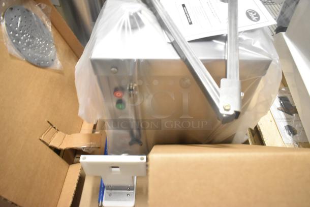 Brand new Globe GSCS2 electric cheese shredder, stainless steel, 65 lb./min capacity, in protective packaging.
