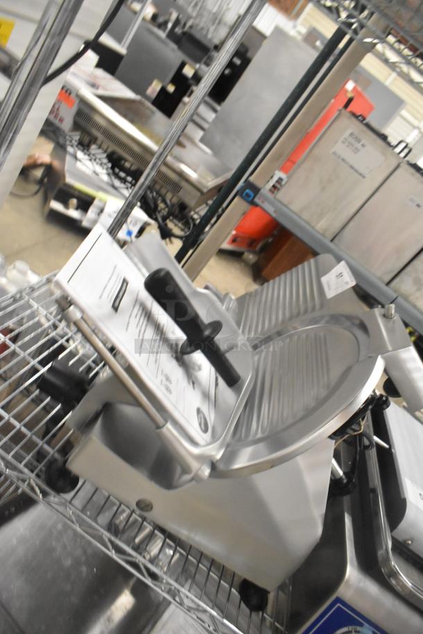 Brand new Globe C12 stainless steel commercial meat slicer with blade sharpener, 115V, 1 Phase, on a metal shelf.