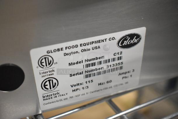 Globe C12 commercial meat slicer label showing model, serial number, and specs. Stainless steel, 115V, 1-phase. Made in Italy.
