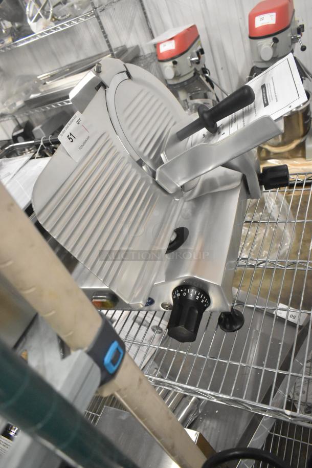 BRAND NEW Globe C12 stainless steel commercial meat slicer with blade sharpener. Features include 115 volts, 1 phase.