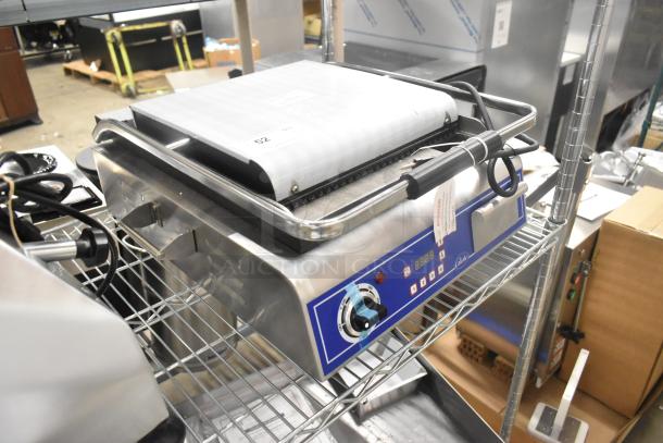 BRAND NEW Globe C12 stainless steel commercial countertop panini press, model GPG14D, 120V, 1-phase, with control panel.