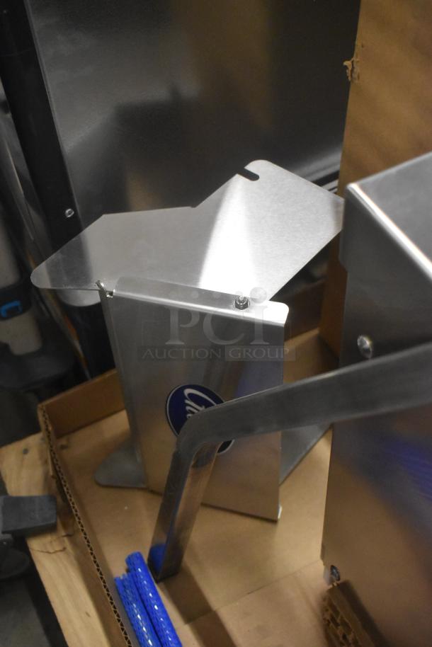 Brand new Globe GSCS3-3 metal electric cheese shredder, 65 lb/min, 230V, 3 phase, with logo visible on the metal body.