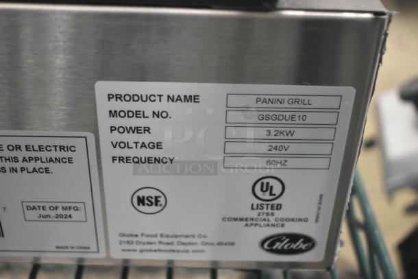 BRAND NEW Globe GSGDUE10 stainless steel double panini press, 240V, 3.2KW, with NSF and UL certification labels.