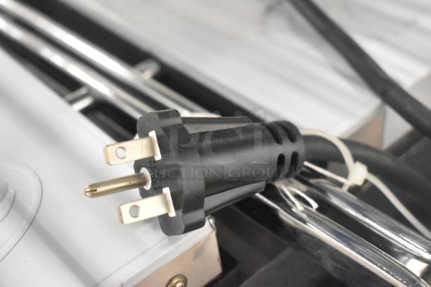 BRAND NEW! 2024 Globe GSGDUE10 stainless steel countertop double panini press, 240V, 1 phase, power cord shown.