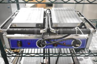 Brand new 2024 Globe GSGDUE10 stainless steel commercial countertop double panini press, 240V, 1 phase, with controls.