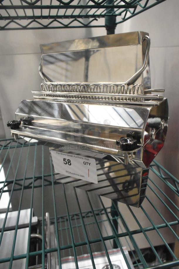 Brand new stainless steel commercial pasta noodle cutter, shiny finish, adjustable knobs, item tag with auction details attached.