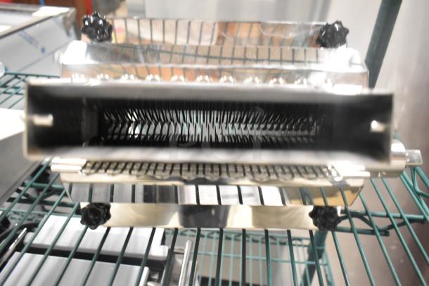 Brand new stainless steel commercial pasta noodle cutter, features sharp blades and durable construction.