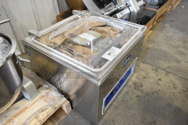 Brand new 2023 Globe GVP20 commercial vacuum sealer with 16 1/2" seal bar, stainless steel, 110V, 1 Phase, visible product tag.