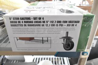Box of 4 brand new 5" Focus commercial stem casters, heavy-duty, non-marking, 300 lb capacity each, with swivel and brakes.