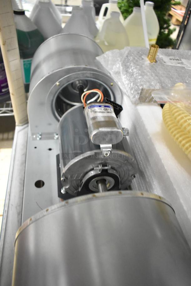 Genteq 71241560 Metal Blower, 208-230V, 1 Phase. Features a metallic housing; appears in good condition.