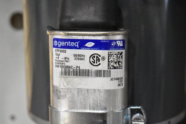 Genteq 71241560 metal blower, 208-230V, 1 Phase. Features label with specifications and certifications. In good condition.