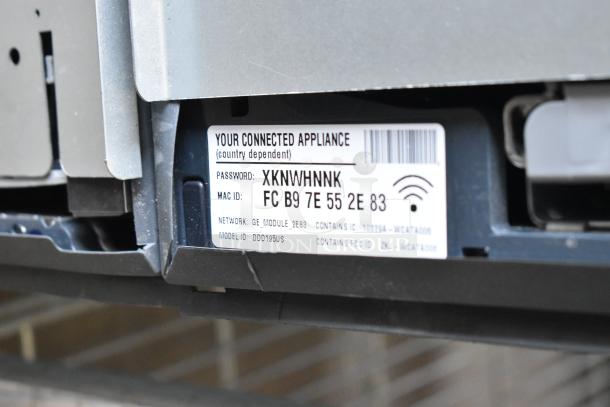 FP Metal Unit, 110-120 Volts, 1 Phase. Label shows password, MAC ID, network, model ID DDD195US, and FCC ID.