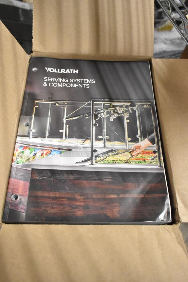 Three new boxes of Vollrath booklets titled "Serving Systems & Components," unopened in original packaging.