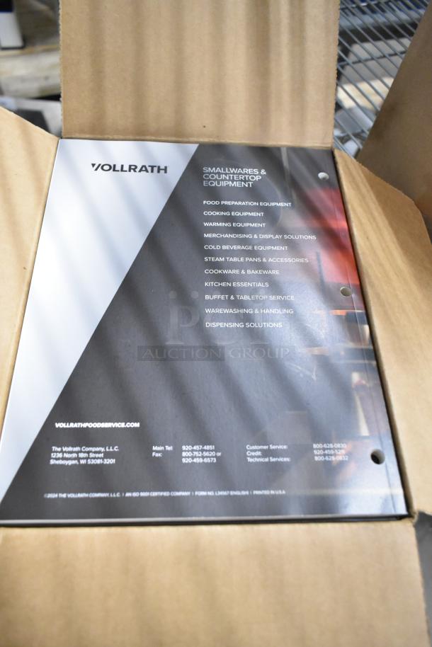 Three brand new Vollrath booklets in box, detailing smallwares and countertop equipment.