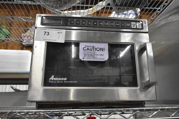 Amana HDC10 stainless steel commercial microwave oven, 120 volts, 1 phase, visible caution label, used condition.