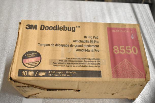 3M Doodlebug Hi Pro Pads box, model 8550, contains 10 pads, dimensions 4 5/8 in x 10 in, for heavy-duty scrubbing.
