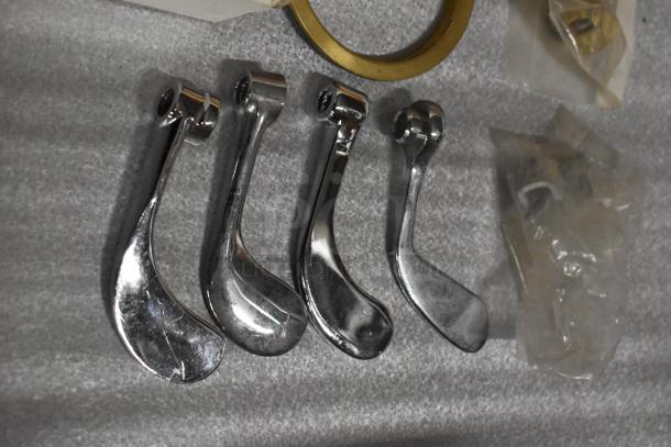 Lot of various items including four chrome handles and a brass ring, some items in packaging, suitable for repair projects.