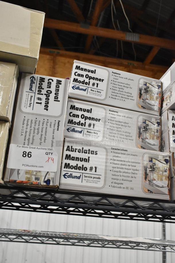 Four brand new Edlund #1 metal manual can openers in boxes, featuring a rust-resistant arbor and heavy-duty design. Made in USA.