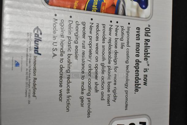 Box of Edlund #1 Metal Manual Can Opener. Features include improved casting, replaceable parts, and smooth glide action. Made in USA.