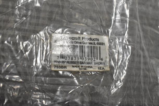 8 new Tablecraft 753BR 27"L brown rubber bar mats in original packaging. Label indicates product details.