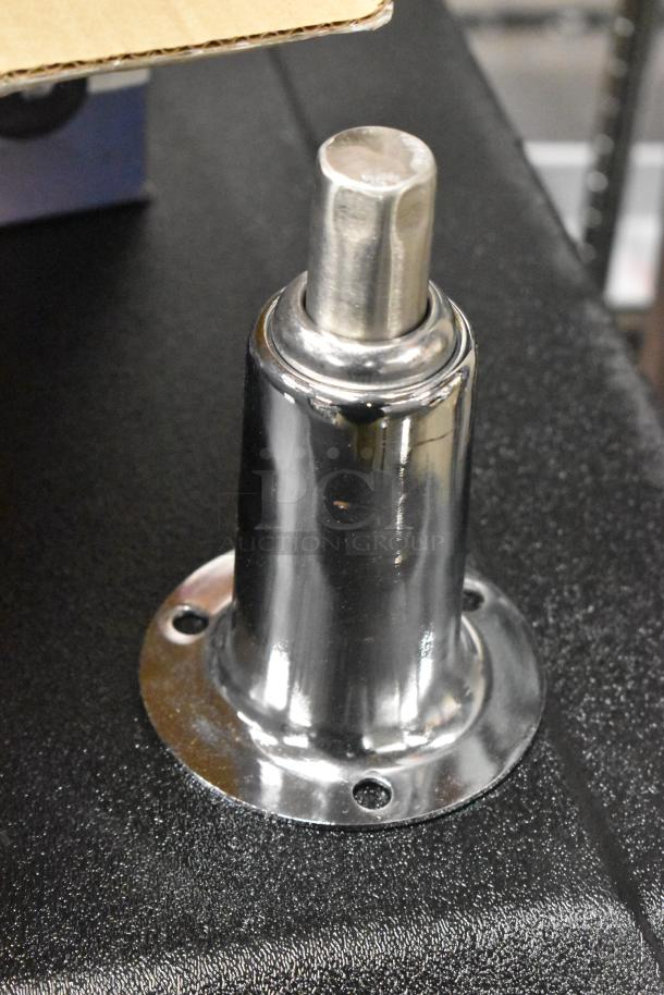 Brand new set of 4 polished metal legs, unopened box, smooth finish, durable construction, mounting holes visible.