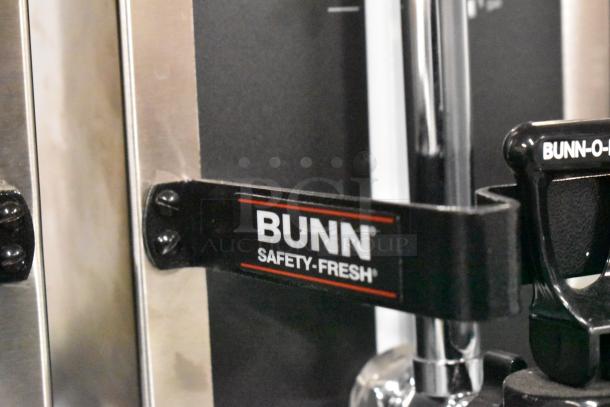 Brand new Bunn 1.5GPR-FF coffee server with top handles, fast flow faucet, and "Safety-Fresh" marking.