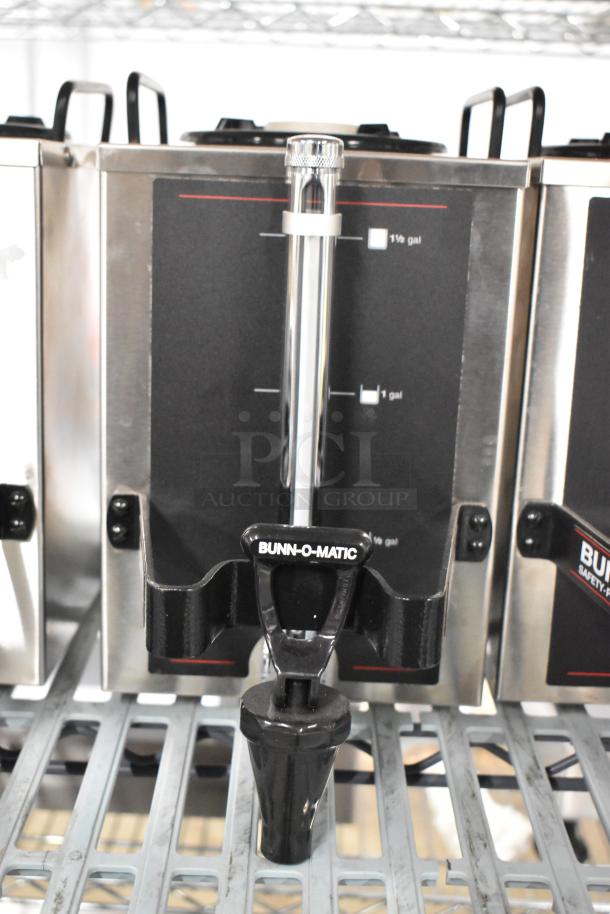 4 new Bunn 1.5GPR-FF portable 1.5-gallon coffee servers with fast flow faucets, top handles, and measurement markings.