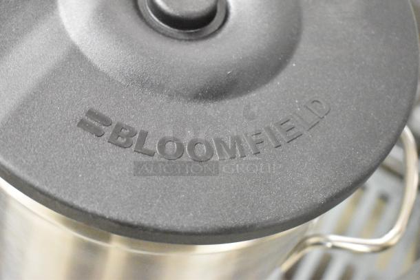 Bloomfield 8799 stainless steel iced tea holder, brand new. Features sturdy construction, Bloomfield logo on lid.