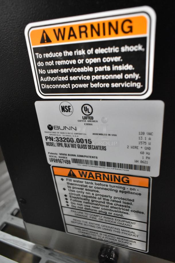 Brand new 2021 Bunn VPR stainless steel commercial coffee machine labels, showing model, safety warnings, and electrical details.