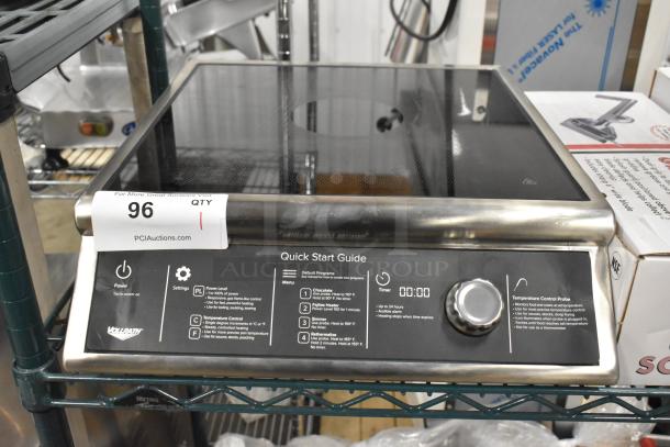 BRAND NEW Vollrath HPI4 Metal Induction Range, single burner, electric-powered, 208-240V, 1 Phase, quick start guide visible.