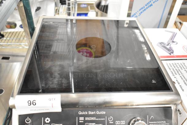 Brand new Vollrath HPI4 induction range. Single burner, metal, electric, 208-240V, 1-phase. Quick Start Guide visible.