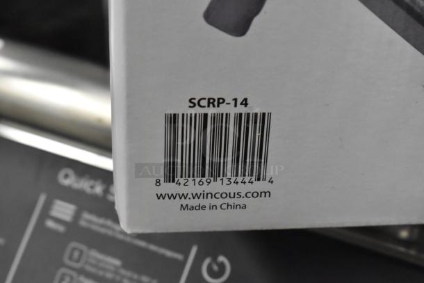 BRAND NEW! Winco Heavy Duty Aluminum Grill Scraper, model SCRP-14, shown in packaging with barcode and Winco website.