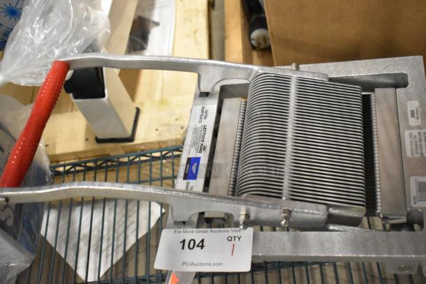 Brand new Vollrath Redco Lettuce King cutter with red handle, stainless steel blades, and model markings. Auction tag no. 104.