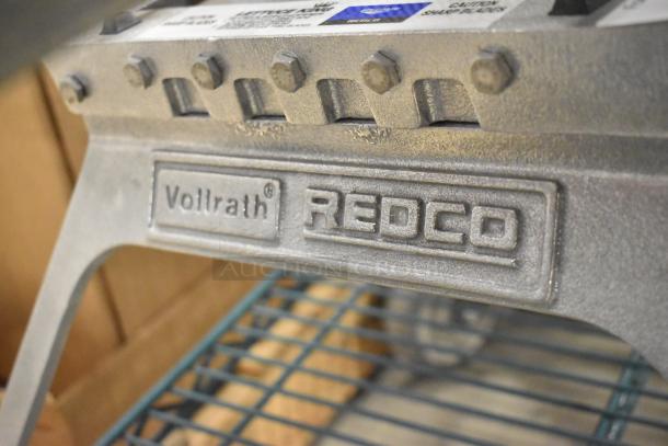 Brand new Vollrath Redco Lettuce King cutter, metal body with visible bolts, embossed branding, ideal for efficient slicing.