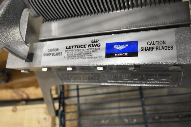 BRAND NEW Vollrath Redco Lettuce King Cutter, sharp stainless blades, labels indicating usage and caution.