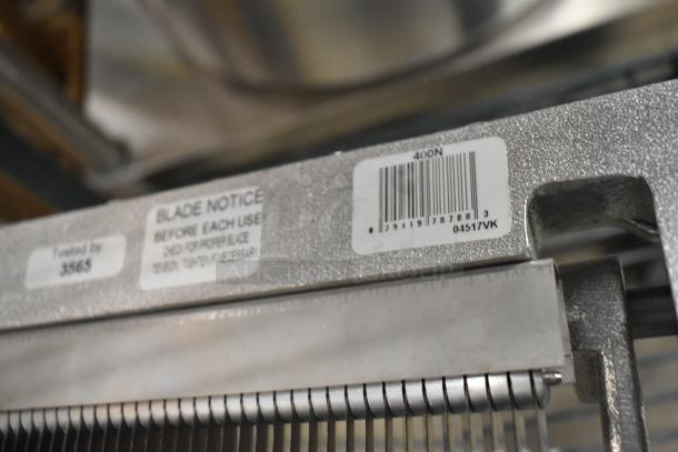 Brand new Vollrath Redco Lettuce King cutter with blade notice and barcode visible, indicating model 400N.