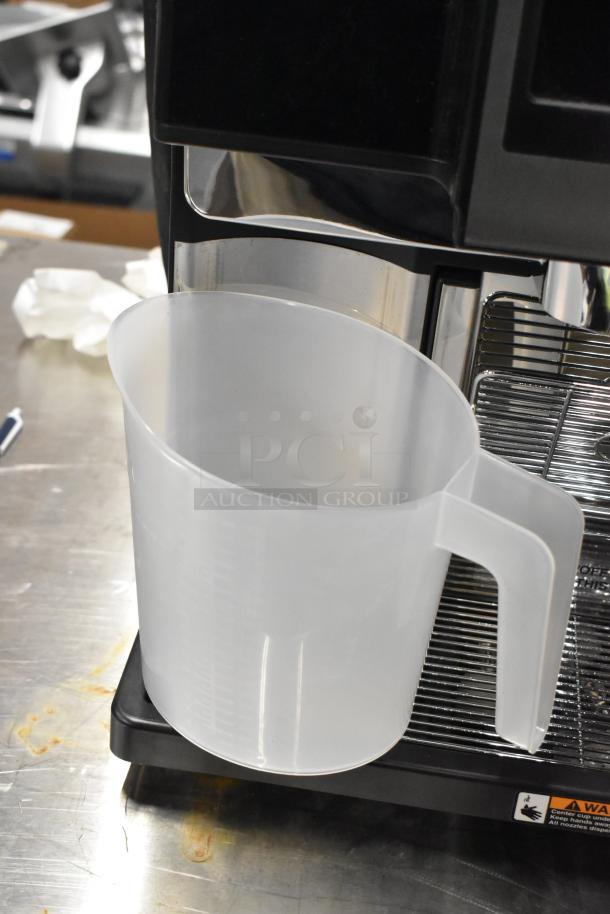 Stainless steel commercial countertop espresso machine, brand new, with hot water dispenser, 120/208-240V, 1 phase.